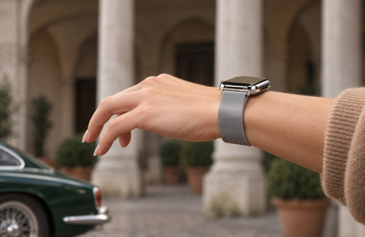 Woman wearing the silver WsC Milanese Loop Apple Watch strap, standard non-diamond lifestyle photograph