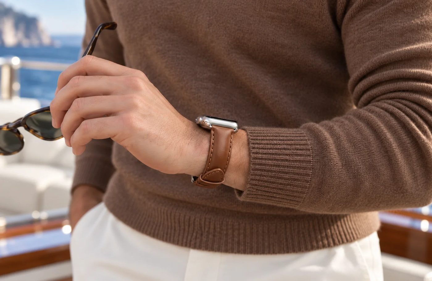 Man wearing a tan leather strap